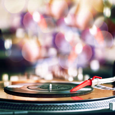 Vinyl record spinning on DJ player