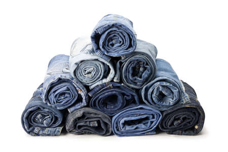 Jeans trousers stack on white backgroundの写真素材