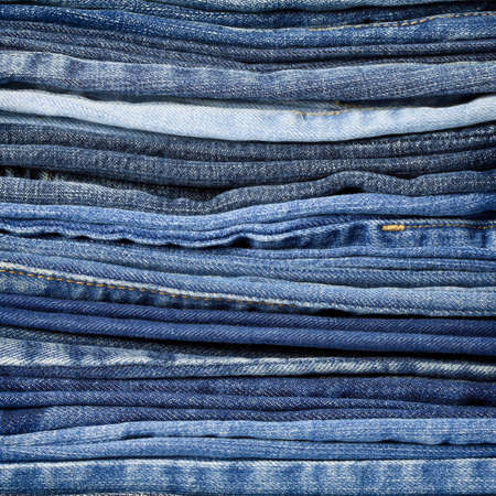 Jeans trousers stack closeupの写真素材