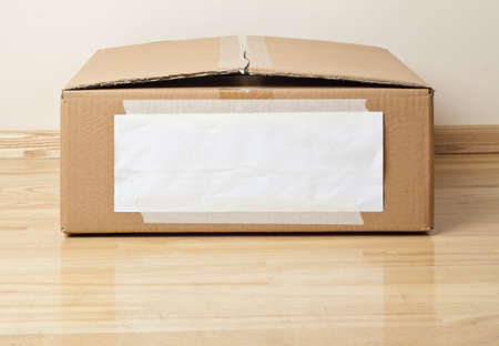 Cardboard box with blank label  Moving, storage concept 