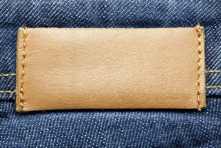 Leather jeans label sewed on jeans  の写真素材
