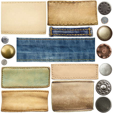 Blank leather jeans labels, buttons, straps isolated on white background
