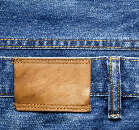 Blue jeans trousers, leather label.