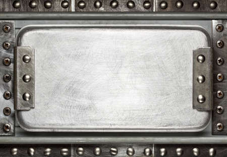 Industrial metal plate background with rivetsの写真素材