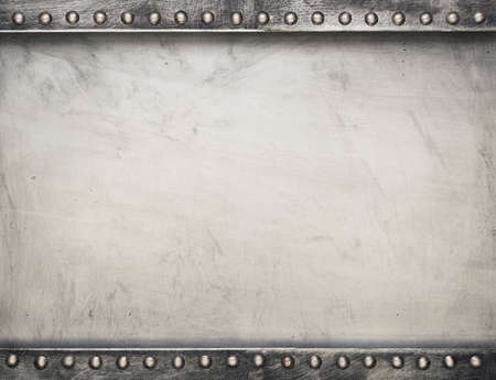 Industrial metal plate background with rivetsの写真素材