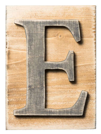 Wooden alphabet letter block isolated on whiteの写真素材