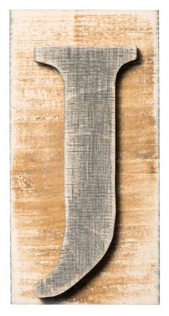 Wooden alphabet letter block isolated on whiteの写真素材