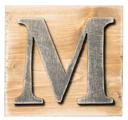 Wooden alphabet letter block isolated on whiteの写真素材
