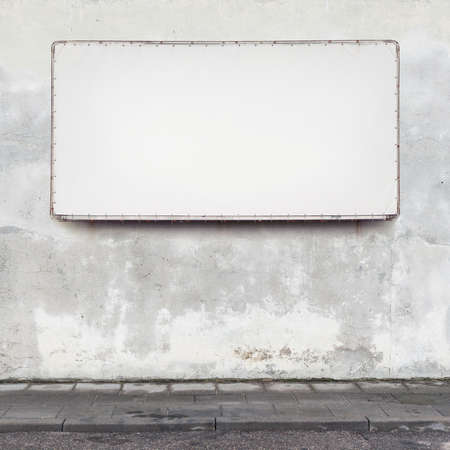 Blank advertising billboard on a street wall.の写真素材