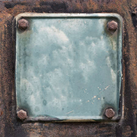 Old Metal plate texture with bolts.の写真素材