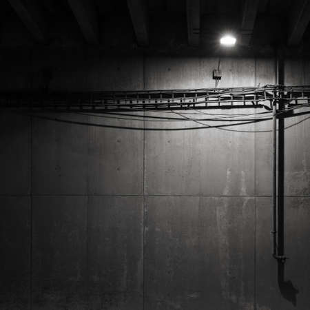 Spotlight on the concrete wallの写真素材