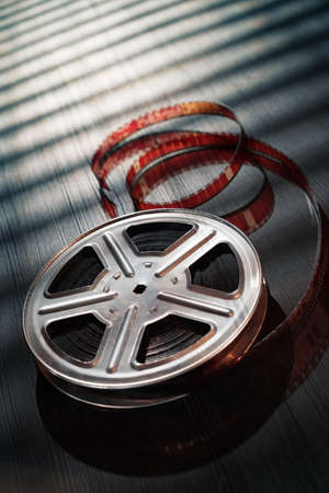 Motion picture film reel on the tableの写真素材