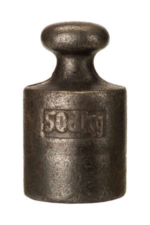 Old rusty iron scale weight isolated on whiteの写真素材