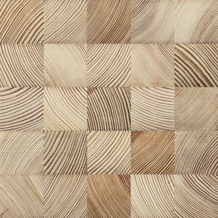 Seamless end grain wood texture. Cross cut lumber blocks.