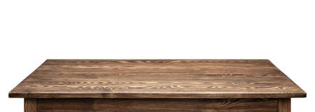 Wooden tabletop on white background. Empty rustic wood table.の写真素材