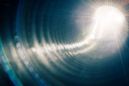 Abstract soft blurry round forms background. Used metal tube. Shallow depth of field.の写真素材