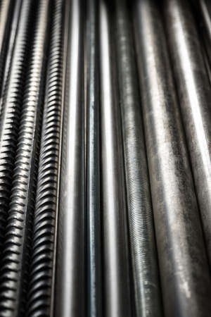 Metal pipes and rods. Steel materials, construction supplies.の写真素材