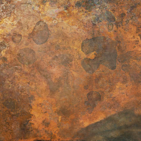 Aged copper plate texture, old worn metal background.の写真素材