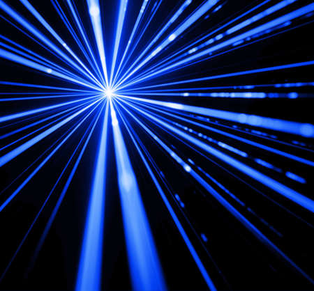 Blue laser beam light effect on black background.の写真素材