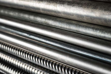Metal pipes and rods. Steel materials, construction supplies.の写真素材