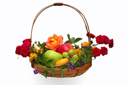 Colorful basket of fruit decorated with flowers isolated on whiteの写真素材