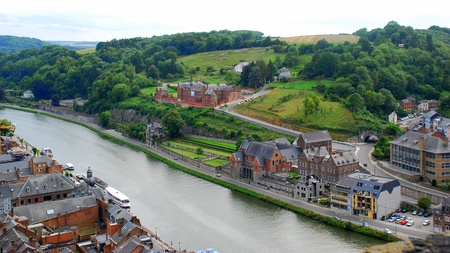 Old city and nature coming together in a wide-open panoramic view   The River Meuse valley with the town of Dinant below の写真素材