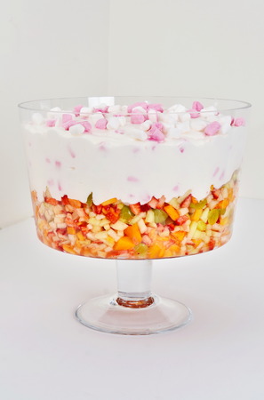 Marshmallows in cream over fruit salad desertの写真素材