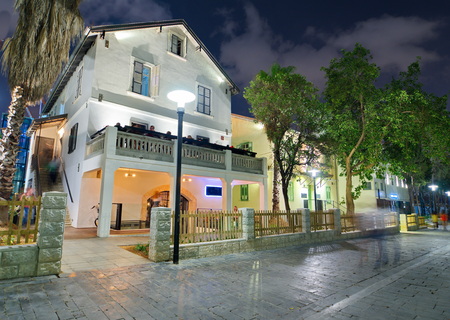 Tel Aviv Night Life - Restored houses at night at the hip Sarona district featuring rich night life and conserved Templer era German architecture from the late 1800'sのeditorial素材