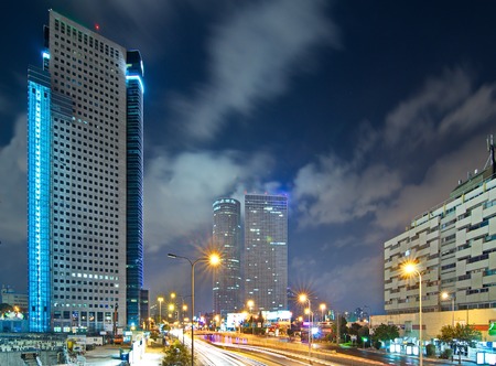 Tel Aviv at Night - Road 20 (Ayalon) the main Tel Aviv expressway at night with car trails and the Tel Aviv moden sky line.のeditorial素材