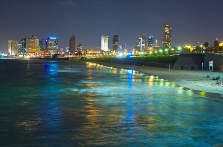 Tel Aviv, Israel skyline coastline reflecting in the Mediterranean Seaの写真素材