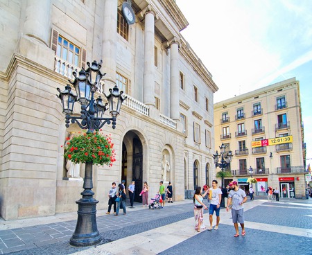 BARCELONA - OCT 16, 2014: People in front of the Barcelona, Spain City Hall buildingのeditorial素材