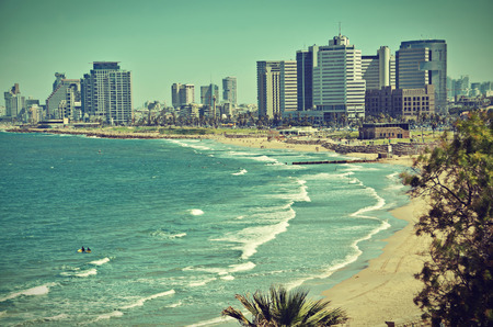 The Tel Aviv, Israel sky line and the Mediterranean beach from Jaffa - old postcard / vintage lookの写真素材