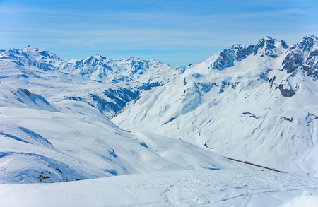 View of the pistes, ski trails, and mountains of the Lech Zurs ski resort, part of the Arlberg  ski area, from a mountainside restaurant.の写真素材