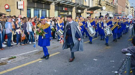 ZURICH, SWITZERLAND - APRIL 13, 2015: People celebrating the Sechselauten (Sachsiluute) - Zurich Spring Festival - celebrated with a parade of the Zunfte (guilds) and burning of the Boogg snowman.のeditorial素材