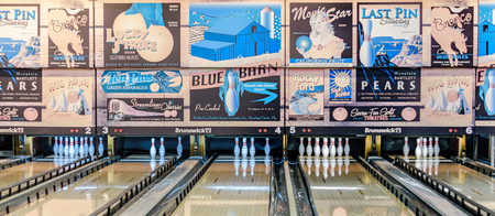 KFAR SABA, ISRAEL - DEC. 12, 2015: A retro style bowling alley near Tel Aviv, Israel featuring old-time bowling adds.のeditorial素材
