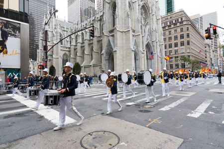 NEW YORK CITY - OCT. 9, 2016: People marching in the 2016 Hispanic Day Parade, part of the Hispanic National Heritage Month, on Fifth Avenue in Manhattan. New York Cityのeditorial素材