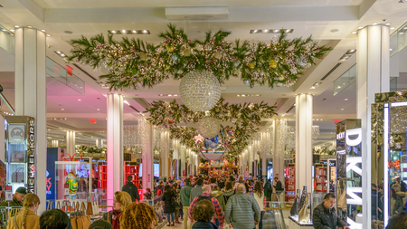 NEW YORK CITY - NOV. 25. 2017: Shoppers filling the beautifully Christmas decorated Macy's Herald Square store  on Black Fridayのeditorial素材