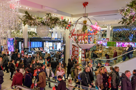 NEW YORK CITY - NOV. 25. 2017: Shoppers filling the beautifully Christmas decorated Macy's Herald Square store  on Black Fridayのeditorial素材