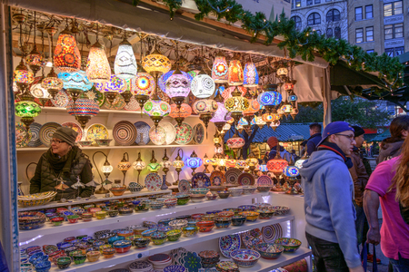 NEW YORK CITY - NOV. 23. 2017: An artistic dishes and lamps stand at the Union Square Holiday Market in Manhattan, New York City on Thanksgiving Dayのeditorial素材