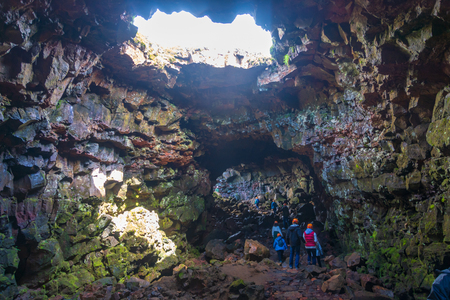 REYKJAVIK, ICELAND - AUG. 2, 2018: People visiting the Raufarholshellir lava tube tunnel and caves, one of the longest in Iceland.のeditorial素材