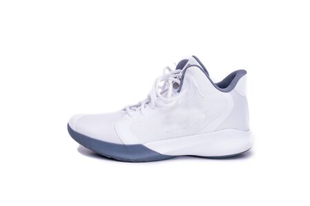 Modern mid-high white basketball shoeの写真素材