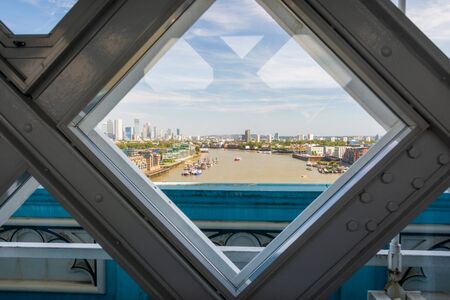 Views of the River Thames and South London from Tower Bridge through a lookout window