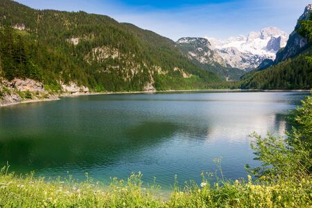 Beautiful spring day on Lake Gosau (Gosausee) in the Austrian Lake Districtの写真素材