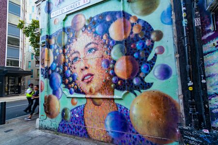 LONDON: August 25, 2019: Amazing street art, murals, and graffiti at the hip Shoreditch quarter of Londonの写真素材