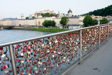 SALZBURG, AUSTRIA - JUNE 6, 2019: Salzburg Makartsteg love lock pedestrian bridgeのeditorial素材
