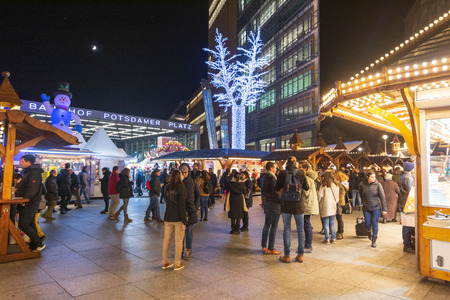 BERLIN - NOV. 15, 2018: People on a night out in Portsdamer Platz, one of the hottest hangouts in the center of Berlin - Slow motion shotのeditorial素材