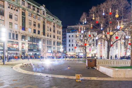 BUDAPEST - DEC. 31, 2019: People lighting fireworks in a square on New Year's Eve in  Budapest, Hungary on the eve of the new decateのeditorial素材