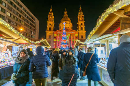 BUDAPEST - DEC. 29, 2019: People enjoying the colorful and famous Budapest Christmas Maekets on the eve of the new year and new decateのeditorial素材