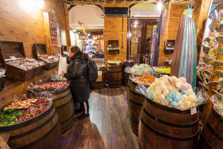 BUDAPEST - DEC. 30, 2019: People enjoying the colorful Great Market in Budapest all decorated and festive for Christmas on the eve of the new year and new decateのeditorial素材