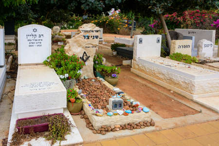 TEL AVIV - OCT. 26, 2019: Modern gravestones at  a secular civil and Jewish cemetery in Israel at...